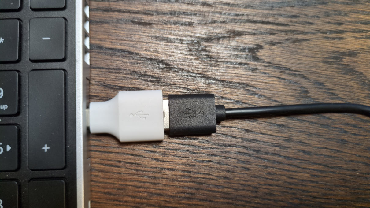 Keylogger between laptop and keyboard